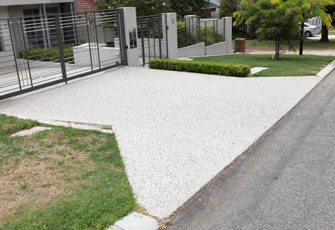 New concrete driveway Perth with gates.